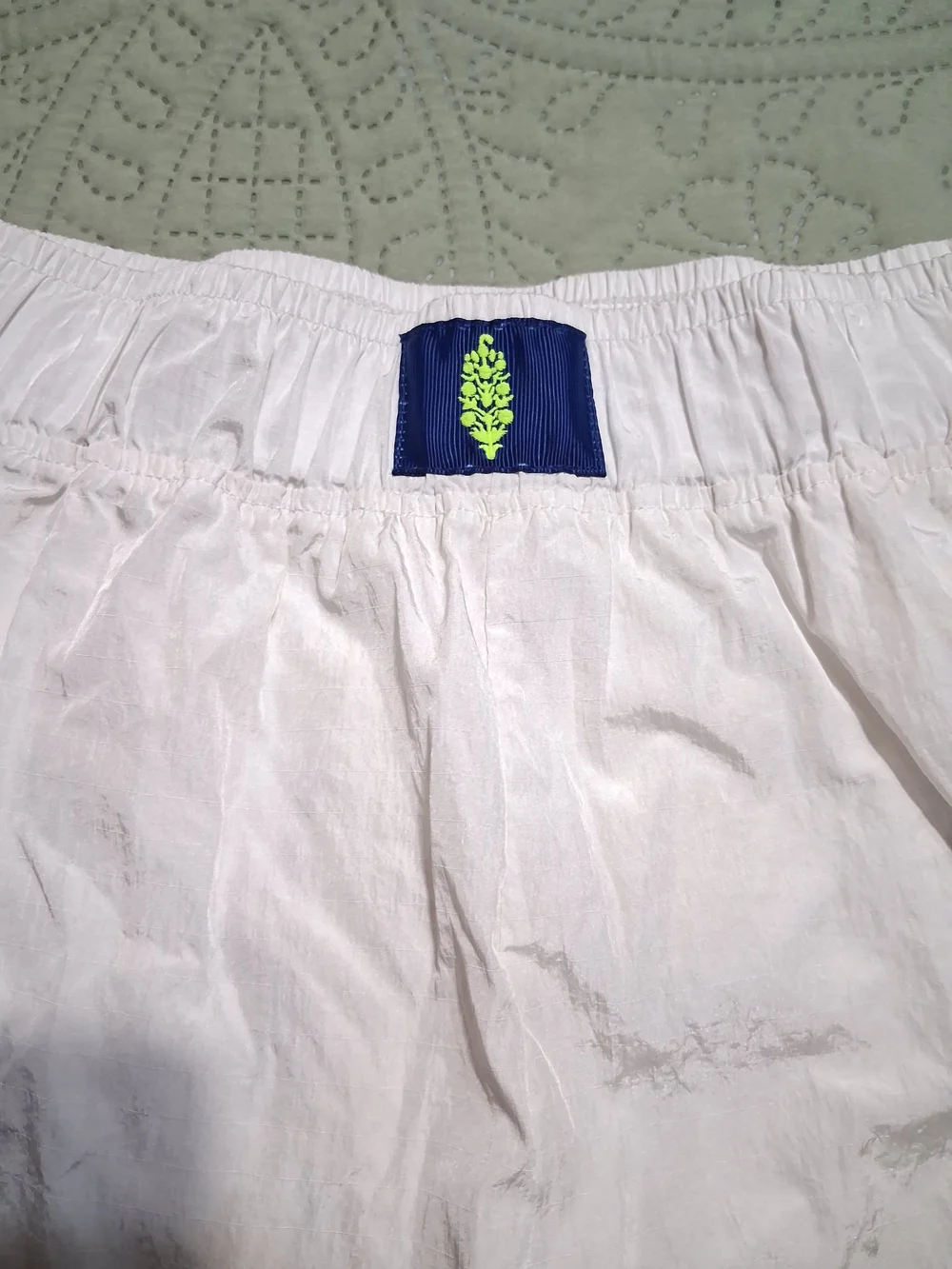 FP Movement by Free People White Athletic Shorts with Navy Trim - Picture 2 of 6